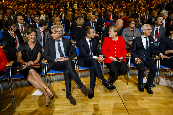Juergen Boos, Emmanuel Macron, Angela Merkel und Heinrich Riethmüller bei der Eröffnungsfeier 2017