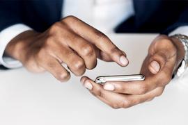 Closeup of hands with an mobile phone