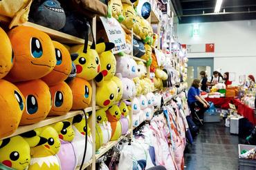 A shelf full of stuffed animals