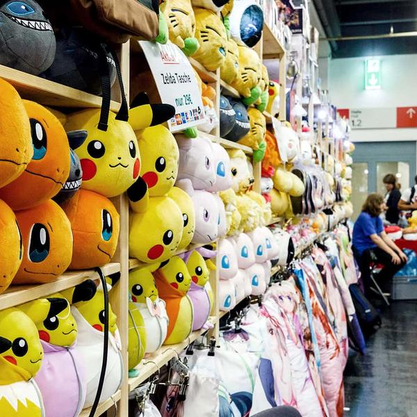 A shelf full of stuffed animals
