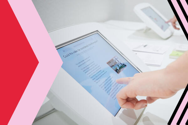 Person is swiping through a page on a tablet computer's display